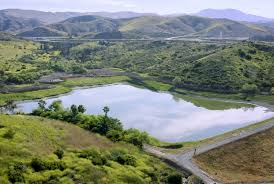 Reservoir with landscape surrounding it
